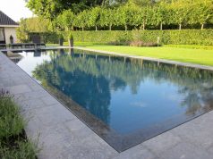Prachtige zwembaden in je tuin: het overloopzwembad